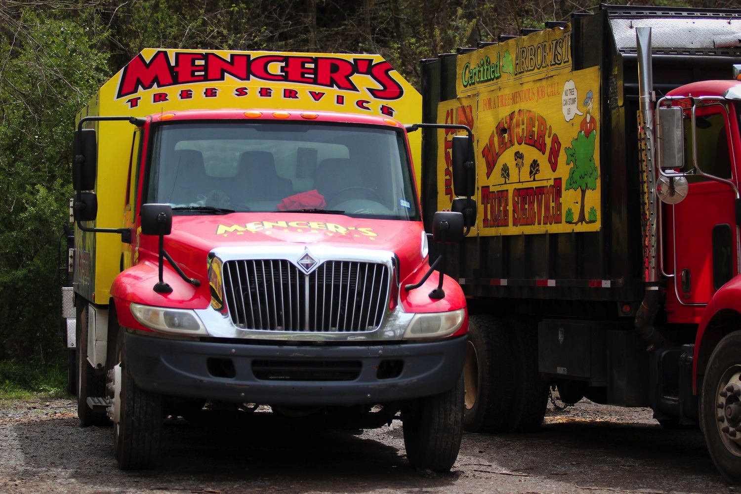 mencers tree service company vehicles
